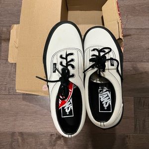 New black and white platform Vans